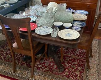 Old Oak Claw Foot Table and Four Chairs (One Chair Needs Wicker Repair)
