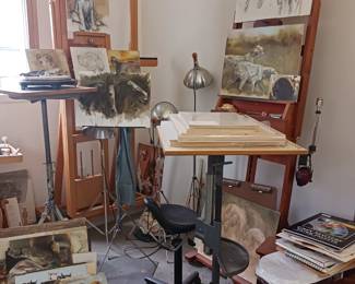 Several gigantic artist easels