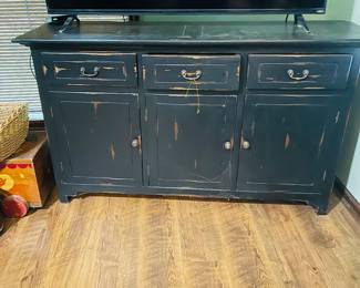 Buffet or chest. Picture does not show how pretty it is. Distressed wood, dark color