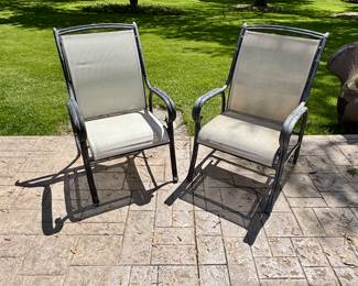 Pair of arm chairs with sling back