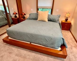Bedroom set by Dyrlund made in Denmark.  King size platform bed, two nightstands, chest of drawers with mirror.  King size mattress set with split boxes.