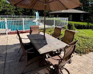 Tropitone rectangular table with 6 chairs, Four arm chairs and two swivel chairs