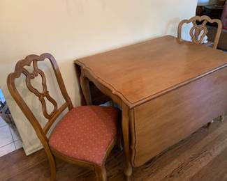 Solid dining room table and 4 chairs