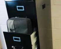 Black Metal Filing Cabinet With Office Supplies 