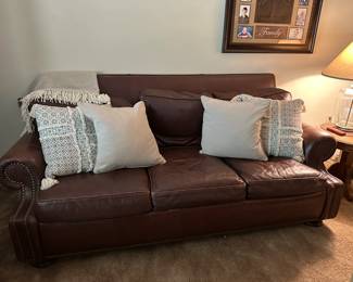 There are 2 leather couches 