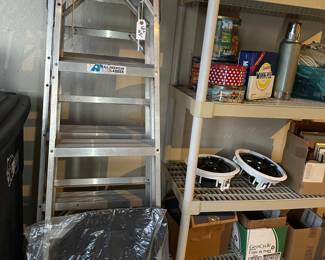 8 ft and 6ft aluminum ladders and brand new floor mats for a Subaru Outback
