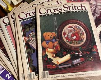 Lots of crafters memorabilia 
Stencil patterns, cross stitch fabric and patterns, yarn, and knitting books 