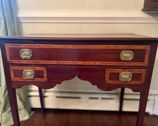 Charming little mahogany server...it works absolutely everywhere...