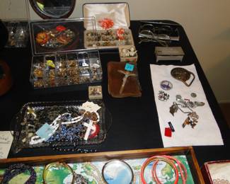 Large assortment of rosaries, and jewelry