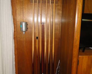 Pool cues and chalk holder included