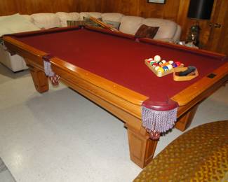 Pool table complete with cues, and balls