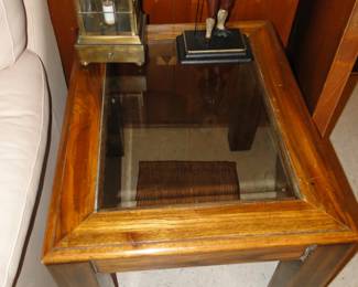 Another solid wood and glass table