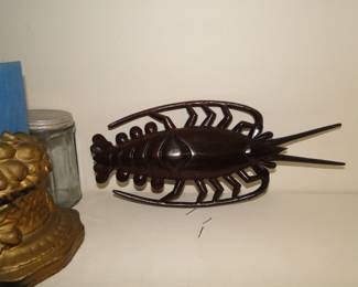 Its a wooden lobster, and here you thought it was cockroach