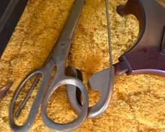 Huge brass scissors, safety pin and needle