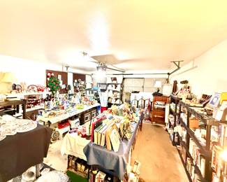 Overview of the packed garage! We have all sorts of treasures in here! PLUS the shed & tons of items outside 🙂