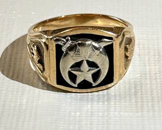 14K yellow and white gold Shriners ring with a 13mm square cushion-cut black onyx. Stamped "14K" inside band.

