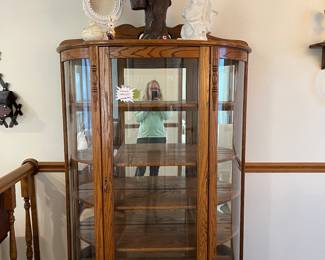Nice oak china cabinet.  Ask for key.