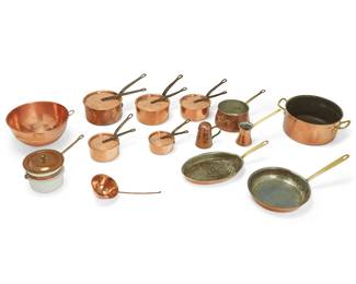 399
Late 20th century; France
A group of Cordon Bleu hammered copper cookware
Most marked: Cordon Bleu / B [fleur de lis] A / France; bain-marie marked: Made in Portugal; cheese shaker marked: Korea
Comprising 1 stockpot, 1 skillet, 1 oval sauté pan, and 5 lidded saucepans of graduated sizes, together with the associated: 1 lidded stoneware bain-marie, 1 mixing bowl, 1 Turkish coffee pot, 1 cheese shaker, and 1 ladle, 13 pieces
Stockpot: 5.625" H x 15.375" W x 11.625" D; Smallest saucepan: 5.25" Dia.
Estimate: $500 - $700
