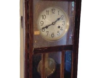 Working antique key wind wall clock
