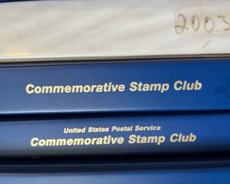 USPS Commemorative Stamp Club binders with stamps from 1989 to 2018