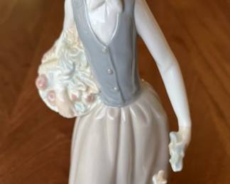 Lladro "Girl with Flowers Feeding Goose"