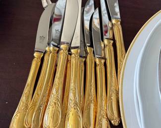 Oneida gold colored stainless steel butter knives