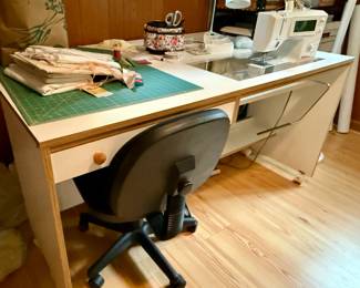 Adjustable sewing table