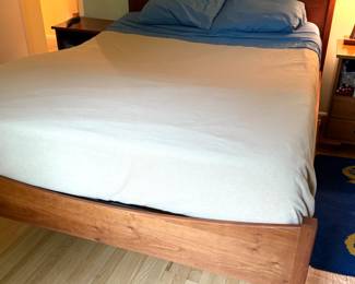 Queen size wood bed with adjustable mattress