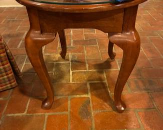 Oval side table with glass top