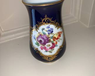 Delicate Meissen 4" Porcelain vase with intricate design.