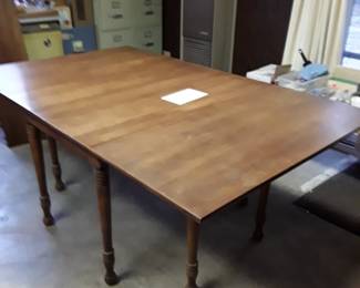 Large hardwood table with three leaves, six chairs. $300