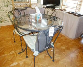 $240 - Cast Metal Table (glass top) with 6 Chairs (was $360)