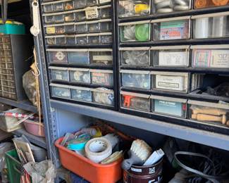 small cabinets filled with nuts bolts etc