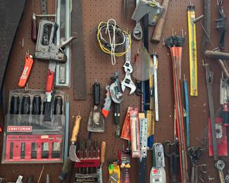 assortment of hand tools and garage items