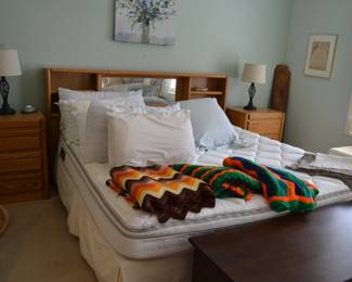 Queen Bed with attached shelf unit