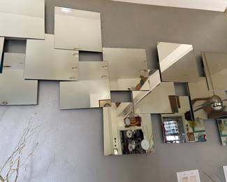 Two abstract mirrors overlapping