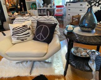 Swivel chair on chrome base by Avenue Six, painted rattan and wicker table, Living Room