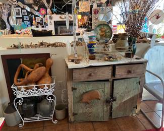 Rustic distressed wooden cabinet in the kitchen ( pig is not attached)