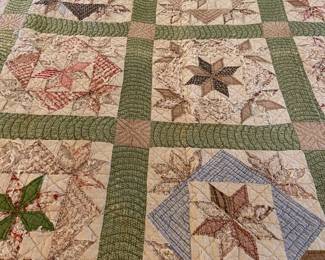 Vintage patchwork quilt, signs of wear