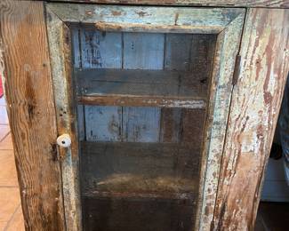 Rustic glass front cabinet in the Pantry