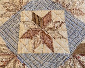 Close-up of Vintage patchwork quilt, signs of wear