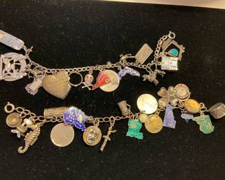 Vintage sterling silver and faux charm bracelets