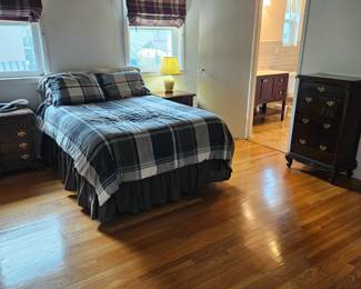 Bed with walnut finish side tables and chest of drawers