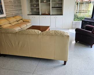 Leather couches, leather chair and coffee table