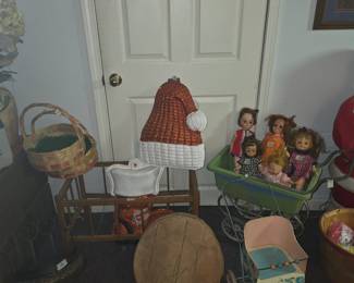 Baskets, doll bed, dolls, baby doll carriage and more - upstairs room over garage 