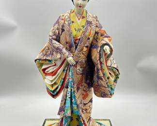 Vintage Japanese Geisha Girl in Costume on Stand