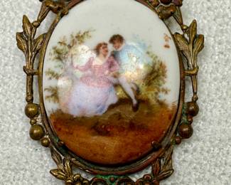 Victorian gold plated hand painted porcelain brooch