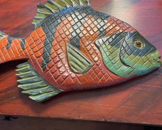 Stephen Huneck carved fish.