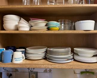 lots of plates, bowls, mugs. 