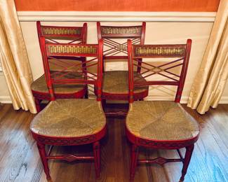 Set of 4 red painted fancy chairs. Rush seats. Purchased from family of Charles A Armstrong (founder of Armstrong Flooring) who acquired them in 1895 in Cape Cod.